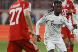Soccer Football - UEFA Champions League - Quarter Final - Second Leg - Bayern Munich v Real Madrid - Allianz Arena, Munich, Germany - April 15, 2026 Bayern Munich's Michael Olise in action with Real Madrid's Eduardo Camavinga REUTERS/Michaela Stache