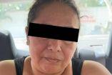 Fotografía de Noemí Cupil de la Cruz, alias "La Patrona" o "La Reina del Cártel de San Lorenzo", con el rostro censurado, tras ser detenida en Ciudad del Carmen, Campeche, por fuerzas federales.