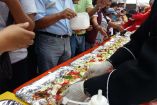 Preparan en Iztapalapa la enchilada más grande del mundo