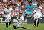 El Atlético de Madrid abrió el marcador, pero Valencia lo empató en la segunda parte. La repartición de puntos fue el resultado de la pareja batalla en Mestalla (Fotos: EFE)