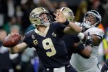Brees guio a los Santos en series de anotación de 92, 79 y 67 yardas luego de verse en desventaja de 14-0 (AP)
