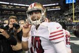 Jimmy Garoppolo debutó en playoffs con Nueva Inglaterra. (AP)