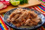 Te enseñaremos a preparar las mejores carnitas. Foto: istock