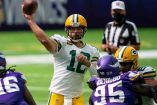Aaron Rodgers completó cuatro pases de touchdown ante Minnesota. (Reuters)