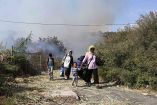 Caen 5 migrantes en Grecia por incendio en campo de refugiados