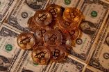 Bitcoin marca nuevo récord de casi 65 mil dólares