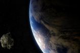 Un asteroide pasando junto a la Tierra