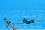 Entrenadora se lanza a la piscina para rescatar a Anita Álvarez