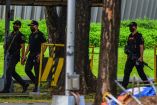 Policías en la Universidad Ateneo de Manila donde se registró un tiroteo
