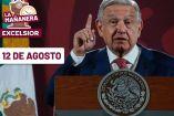 AMLO de traje y levantando un dedo de la mano derecha y a un lado el logo de la mañanera