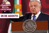 AMLO de traje oscuro y rostro serio, al fondo la bandera de México