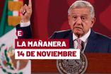 AMLO de traje oscuro en una de sus conferencias