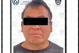 detenido con cinta en los ojos para su protección 