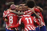 Jugadores del Atlético de Madrid festejan.