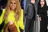Paulina Rubio con traje amarillo y Fangoria posando en ciudad