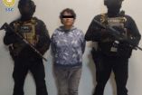Mujer detenida por extorsiones.