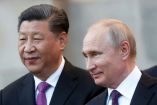 Vladimir Putin, presidente de Rusia, junto al presidente chino Xi Jinping. (Reuters)