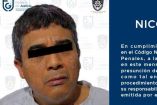 detenido con cinta en los ojos para su protección 