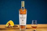 Botella de Macallan acompañada con naranja 