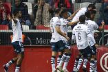 Jugadores de Puebla celebran gol ante Toluca en Apertura 2023.