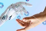 Mano robótica de inteligencia artificial y mano humana.