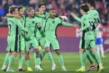 Jugadores de Atlético de Madrid celebran gol.