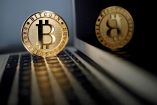 El bitcoin llega a la bolsa de EU, regulador aprueba 11 fondos ETFs 