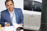 Fiscal antimafia de Ecuador César Suarez junto a su camioneta baleada.
