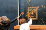Ahora la Mona Lisa activistas contra el cambio climático arrojan sopa a la obra