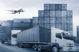 Contenedores de carga, un avión y dos camiones de carga.
