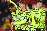Jugadores del Arsenal celebran gol ante Sheffield United.