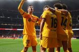 Jugadores del Barcelona celebran el 0-3 al Atlético de Madrid en el Estadio Metropolitano.