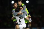 Jugadores de Xolos celebran triunfo en el Clausura 2024.