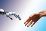 Mano humana y robótica.