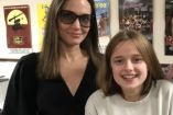 Angelina Jolie con lentes abrazando a hija Vivienne