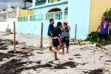 Denuncian a pareja de extranjeros que intentan adueñarse de playa en Yucatán de manera ilegal