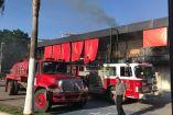 Bomberos en la zona de la explosión