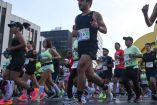 Personas corriendo en Medio Maratón CDMX 2024