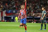Antoine Griezmann celebrando apuntando al cielo.