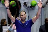Rafael Nadal levantando los brazos.