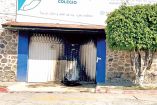Escuela en Cuautla Morelos con la fachada con signos de incendio.