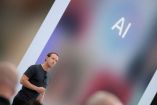 Merk Zuckerberg frente a las iniciales de Inteligencia Artificial
