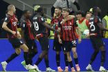 Jugadores del Milan celebrando un gol.