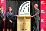 Jon Wolfsthal, director of global risk at the Federation of American Scientists (FAS), Asha George, executive director of the Bipartisan Commission on Biodefense, and Steve Fetter, professor of public policy and former dean at the University of Maryland, reveal the location of the minute hand on its Doomsday Clock, indicating what world developments mean for the perceived likelihood of nuclear catastrophe, during a town-hall in Washington, D.C., U.S., January 23, 2026. REUTERS/Kevin Fogarty