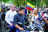 Venezuelan opposition politician Juan Pablo Guanipa rides on a motorcycle to take part in a caravan after his release from prison, as rights group Foro Penal says some political prisoners were freed on Sunday and it is checking more cases, in Caracas, Venezuela, February 8, 2026. REUTERS/Maxwell Briceno