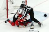Milano Cortina 2026 Olympics - Ice Hockey - Men's Preliminary Round - Group A - Canada vs France - Milano Santagiulia Ice Hockey Arena, Milan, Italy - February 15, 2026. Tom Wilson of Canada clashes with Pierre Crinon of France REUTERS/Mike Segar     TPX IMAGES OF THE DAY