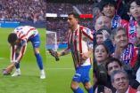 José María Giménez salva a paloma y aficionados lo aplauden sobre el terreno de juego.