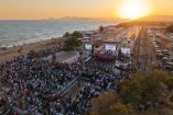 Vista aérea de inauguración del malecón Empalme con escenario, asistentes y playa al atardecer en Sonora durante evento oficial.