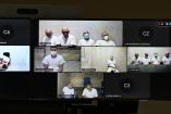 Pantallas muestran a acusados de MS-13 conectados a audiencia virtual desde cárceles en El Salvador durante juicio masivo en Soyapango.