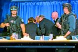 U.S. President Donald Trump is escorted out as a shooter opens fire during the annual White House Correspondents' Association dinner in Washington, D.C., U.S., April 25, 2026, in this screen capture from video. REUTERS/Bo Erickson THIS IMAGE WAS PROCESSED BY REUTERS TO ENHANCE QUALITY, AN UNPROCESSED VERSION HAS BEEN PROVIDED SEPARATELY.     TPX IMAGES OF THE DAY